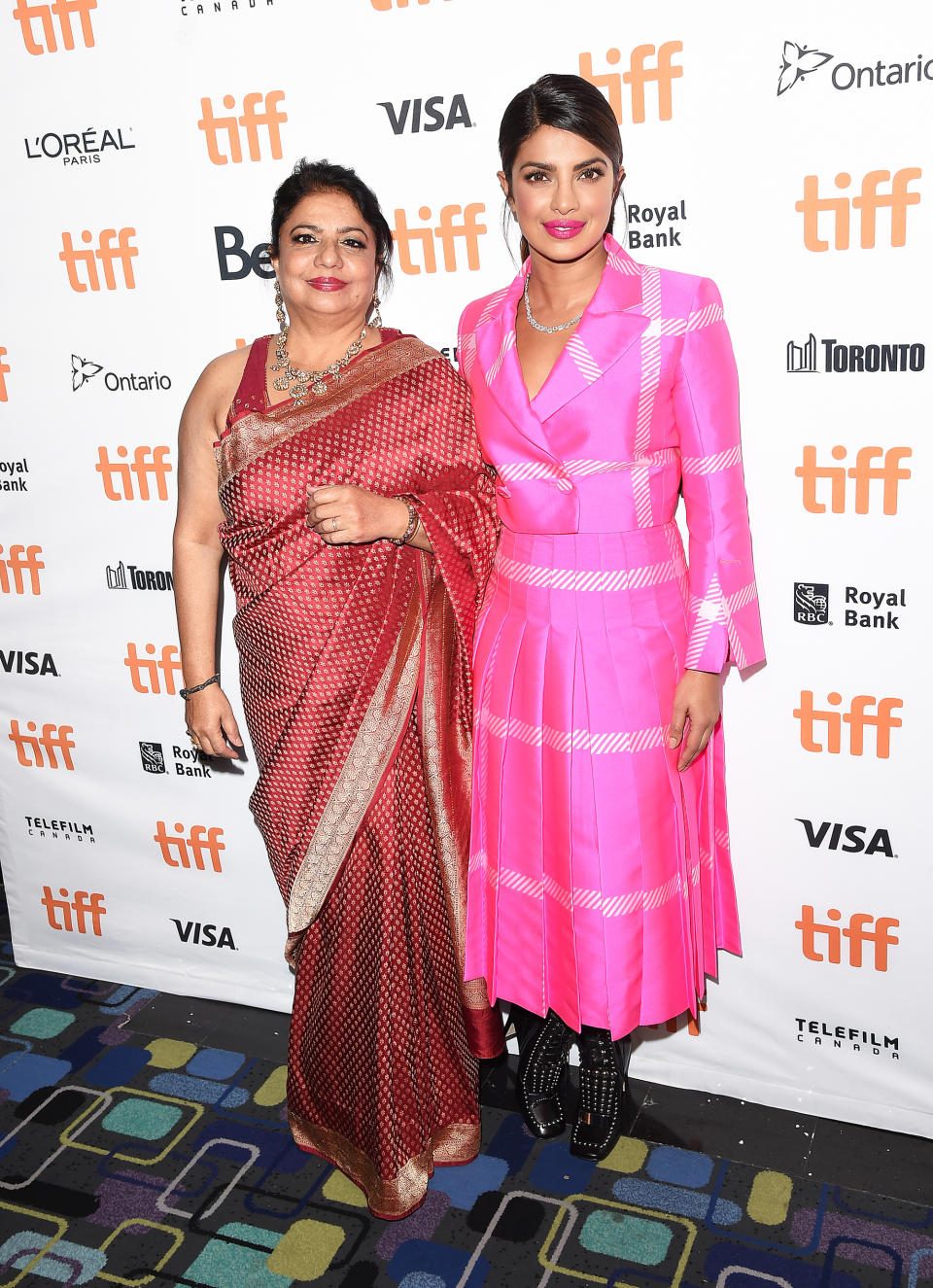 <p>Madhu Chopra (left) and <a rel="nofollow" href="https://www.yahoo.com/tv/tagged/priyanka-chopra" data-ylk="slk:Priyanka Chopra;elm:context_link;itc:0;sec:content-canvas" class="link ">Priyanka Chopra</a> at the <a rel="nofollow" href="https://www.yahoo.com/movies/tagged/toronto-film-festival" data-ylk="slk:2017 Toronto International Film Festival;elm:context_link;itc:0;sec:content-canvas" class="link ">2017 Toronto International Film Festival</a> as producers of <i><a rel="nofollow noopener" href="http://www.tiff.net/tiff/the-little-visitors/" target="_blank" data-ylk="slk:Pahuna: The Little Visitors;elm:context_link;itc:0;sec:content-canvas" class="link ">Pahuna: The Little Visitors</a>,</i> on Sept. 7 (Photo: J. Merritt/Getty Images) </p>