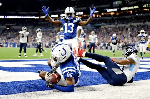 Wide receiver T.Y. Hilton #13 of the Indianapolis Colts celebrates after wide receiver Dontrelle Inman #15 scores a touchdown in the fourth quarter of the game against the Tennessee Titans at Lucas Oil Stadium on November 18, 2018 in Indianapolis - Credit: Bobby Ellis/Getty Images