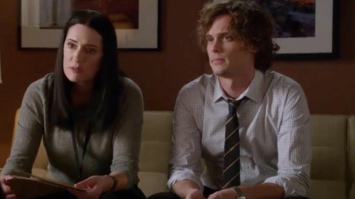  Paget Brewster and Matthew Gray Gubler sitting next to each other. 