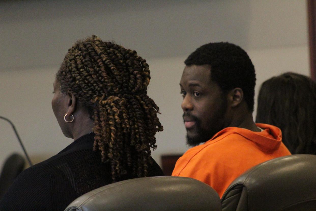 Kwentel Moultrie looks toward Assistant Public Defender Regina Nunnally during his sentencing Wednesday at the Kim C. Hammond Justice Center in Bunnell.