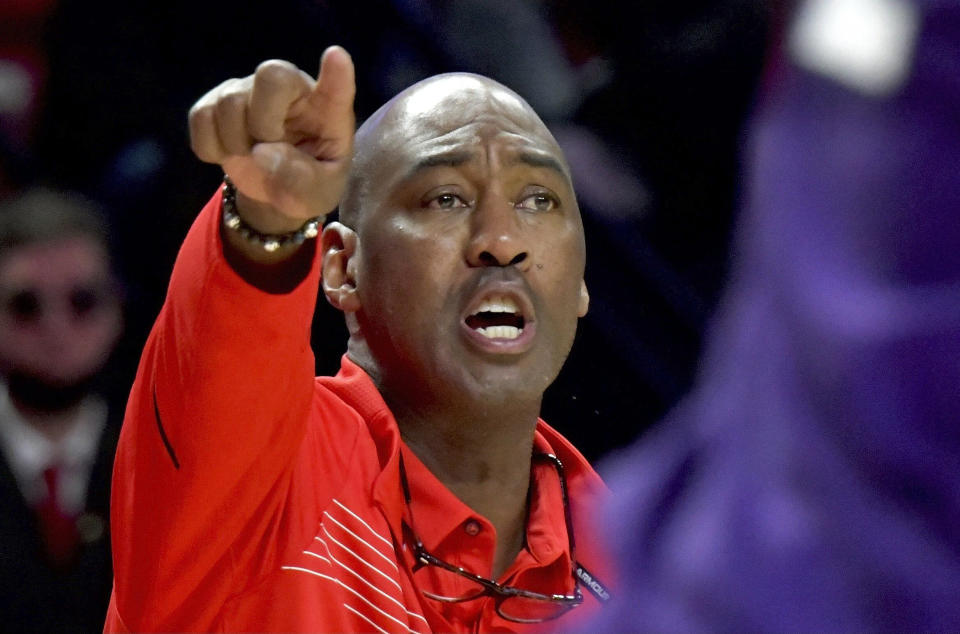 Maryland interim head coach Danny Manning reacts during the first half of an NCAA college basketball game against Northwestern in College Park, Md., Sunday, Dec. 5, 2021. (Amy Davis/The Baltimore Sun via AP)