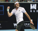 Stefanos Tsitsipas of Greece reacts after defeating Italy's Salvatore Caruso in their first round singles match at the Australian Open tennis championship in Melbourne, Australia, Monday, Jan. 20, 2020. (AP Photo/Dita Alangkara)