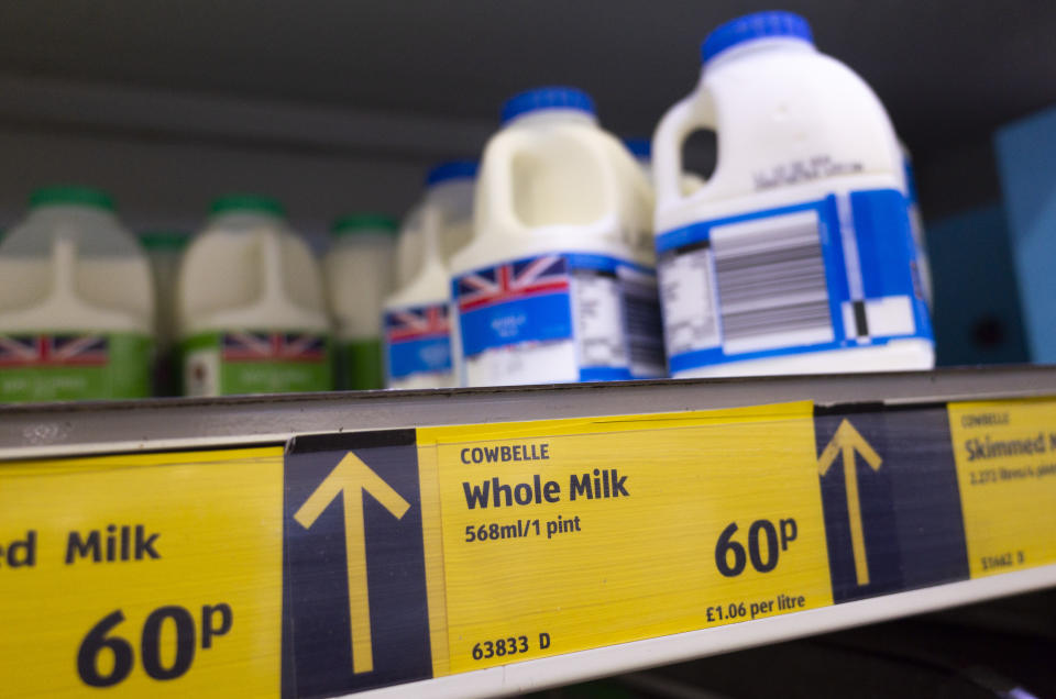 A bright yellow price tag marks the cost of a pint of milk below multiple bottles, each with a logo showing the UK flag, as the cost of basic food staples including meat, bread, and dairy continue to soar in the country, at least in part as a consequence of the war in Ukraine, on 5th April, 2022 in Leeds, United Kingdom. A United Nations food agency, the Food and Agriculture Organization, reports record breaking jumps in the cost of food worldwide as its Food Price Index shows a 12.6% increase in the price of the most globally traded food commodities in just a month. (photo by Daniel Harvey Gonzalez/In Pictures via Getty Images)