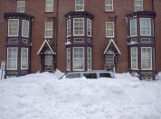 A vehicle is burried in snow in St. John's on Sunday, Jan. 19, 2020. The state of emergency ordered by the City of St. John's continues, leaving most businesses closed and vehicles off the roads in the aftermath of the major winter storm that hit the Newfoundland and Labrador capital. THE CANADIAN PRESS/Andrew Vaughan