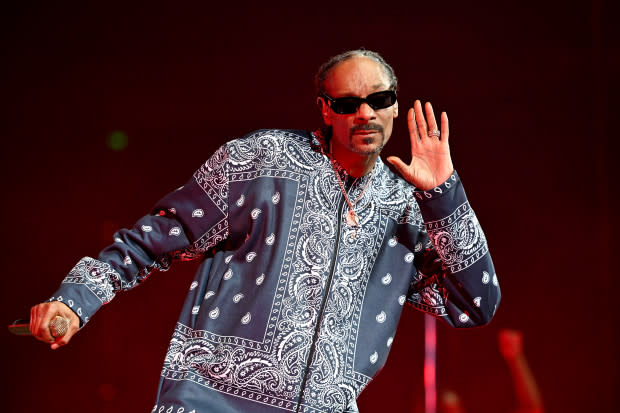 <p>Photo by Stephen J. Cohen/Getty Images</p><p><strong>Snoop Dogg</strong>, the legendary rapper and cultural icon, is not only a musical maestro but also a proud and doting grandfather of six, with one on the way. "My grandkids are my everything because they all individually get a piece of my heart and they're different," the 51-year-old father of three <a href="https://people.com/snoop-dogg-says-grandchildren-are-everything-exclusive-7547006" rel="nofollow noopener" target="_blank" data-ylk="slk:has said;elm:context_link;itc:0;sec:content-canvas" class="link ">has said</a> of his youngest family members. The little ones are Luna, Journey, Zion, Sky, Kai and Elleven.</p><p><strong>Related: <a href="https://parade.com/celebrities/snoop-dogg-net-worth" rel="nofollow noopener" target="_blank" data-ylk="slk:Snoop Dogg's Net Worth in 2023 Is Almost as High as He Is;elm:context_link;itc:0;sec:content-canvas" class="link ">Snoop Dogg's Net Worth in 2023 Is Almost as High as He Is</a></strong></p>