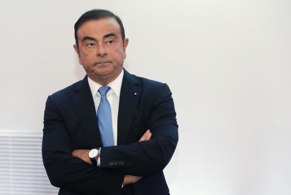 FILE - In this Oct. 6, 2017, file photo, Renault and Nissan Motor Co.'s chairman Carlos Ghosn listens during a media conference outside Paris, France. Nissan Motor Co. says an internal investigation found that its chairman, Carlos Ghosn, has underreported his income. The auto company said he will be dismissed. (AP Photo/Michel Euler, File)