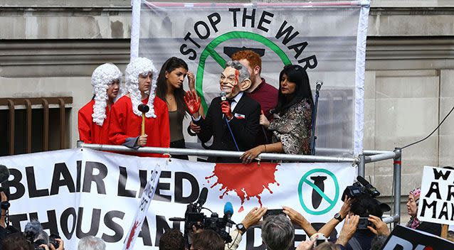 Protestors outside the Queen Elizabeth II Conference Centre, London. Source: AAP