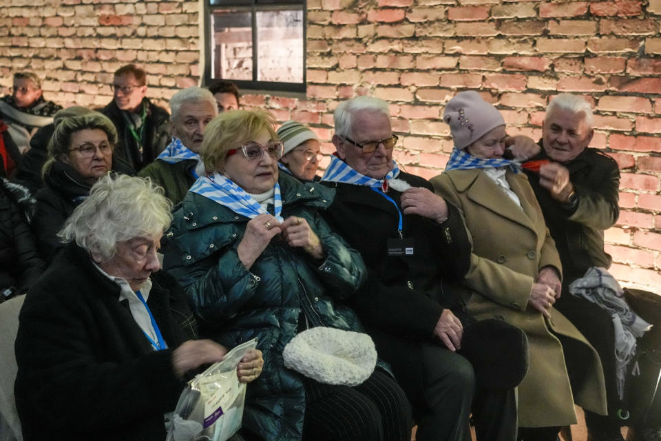 Holocaust survivors attend a ceremony at the Birkenau Nazi death camp in Oswiecim, Poland, Saturday, Jan. 27, 2024. Survivors of Nazi death camps marked the 79th anniversary of the liberation of the Auschwitz-Birkenau camp during World War II in a modest ceremony in southern Poland.(AP Photo/Czarek Sokolowski)
