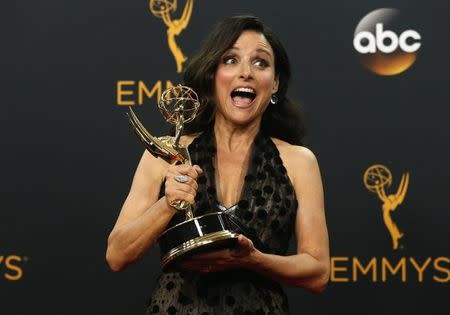 Actress Julia Louis-Dreyfus poses backstage with her award for Outstanding Lead Actress In A Comedy Series for her role in HBO's "Veep" at the 68th Primetime Emmy Awards in Los Angeles, California U.S., September 18, 2016. REUTERS/Mario Anzuoni