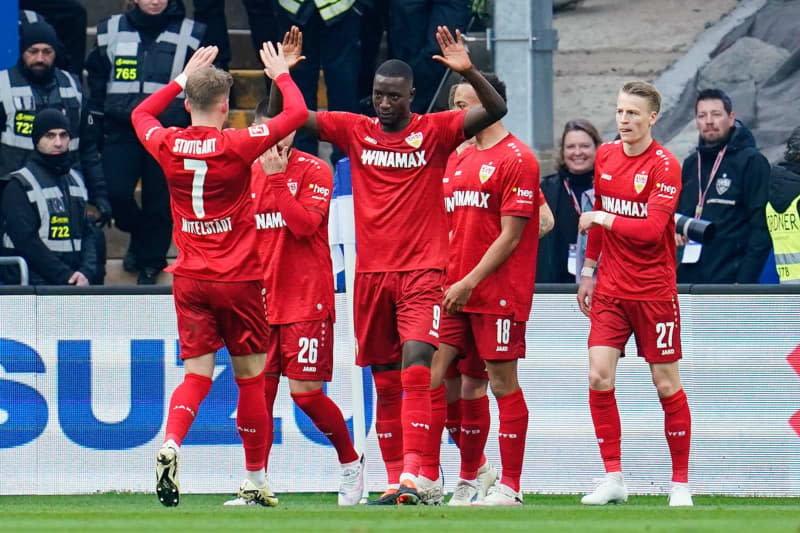 Stuttgart's Serhou Guirassy (C) celebrates scoring his side's first goal with teammates during the German Bundesliga soccer match between SV Darmstadt 98 and VfB Stuttgart at the Merck-Stadion am Boellenfalltor. Uwe Anspach/dpa