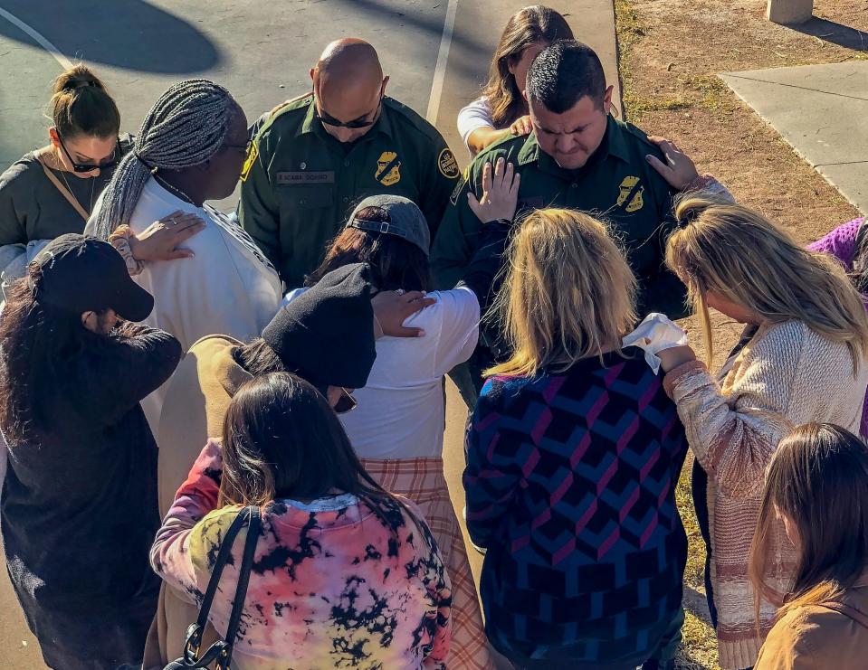 A Women of Welcome group prayed over Border Patrol agents in El Paso, Texas, in November 2021 during one of the group's border immersion trips.