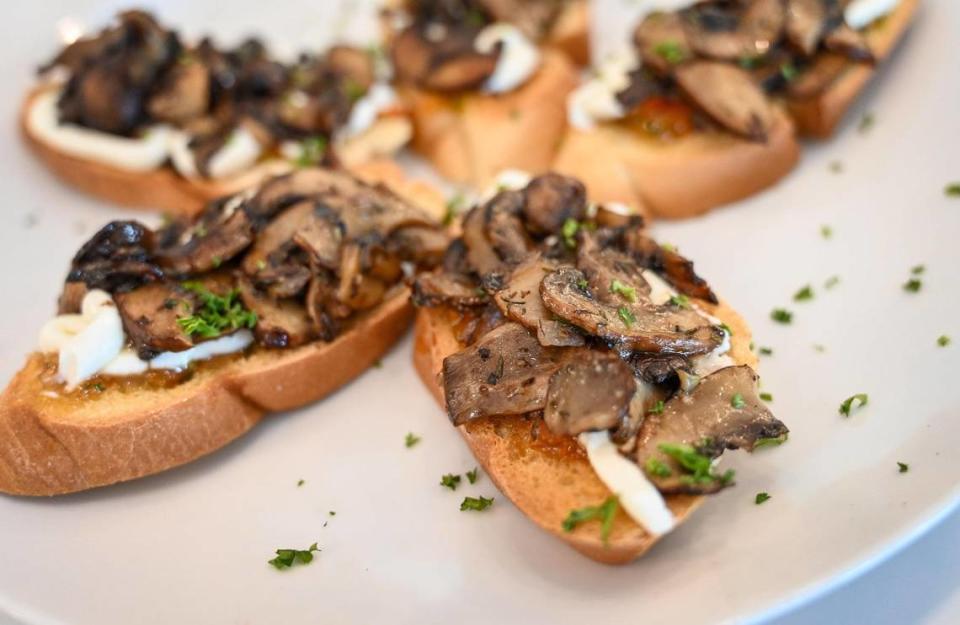 Mushroom bruschetta from Genesis Bistro & 8028 Salon is sautéed mushrooms with goat cheese, shallots and sweet pepper jelly on a toasted baguette.