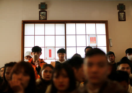 Vietnamese who live in Japan celebrate Vietnamese New Year at a Catholic Church in Kawaguchi, near Tokyo, Japan February 10, 2019. REUTERS/Issei Kato