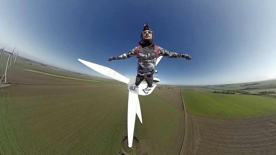 A daring BASE jumper performed a perfect 'low level' stunt from a wind turbine but ended up face-planting the ground after he literally ploughed into a field. Kevin Marret, 28, had a lucky escape - with only his ego bruised - after the less than stellar landing after leaping off the 280ft turbine in the Midi- Pyrenees. The beautiful footage starts out well as Kevin jumps and freefalls for a moment before pulling his shoot. But he opened his chute a fraction of a second too late and, due to excessive forward momentum, ate dirt. Luckily Kevin was uninjured hurt and can see the funny side of the whole affair. Kevin, from Paris, France, said: “I was visiting the location for Base jumping. I performed my chute pull too low, plus it was a bit windy. I need less delay before I pull next time.”