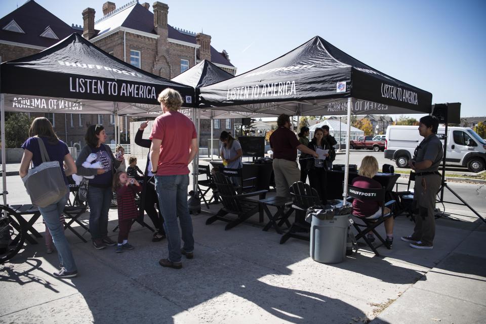 Passers-by&nbsp;check out the "Listen To America" tents during HuffPost's visit to Provo.