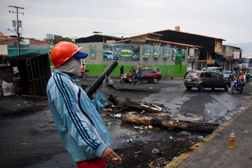 Un manifestante en San Cristobal, estado de tachira, Venezuela, el 21 de febrero de 2014 (AFP | Luis Robayo)