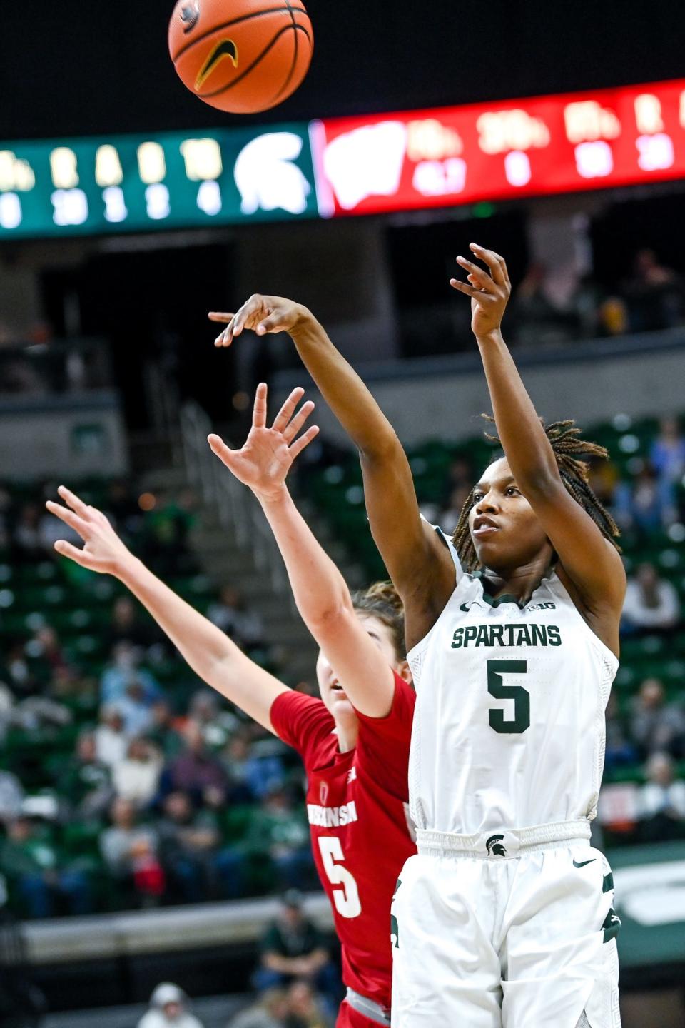 Michigan State's Kamaria McDaniel scores against Wisconsin during the first quarter on Wednesday, Jan. 11, 2023, at the Breslin Center in Lansing.