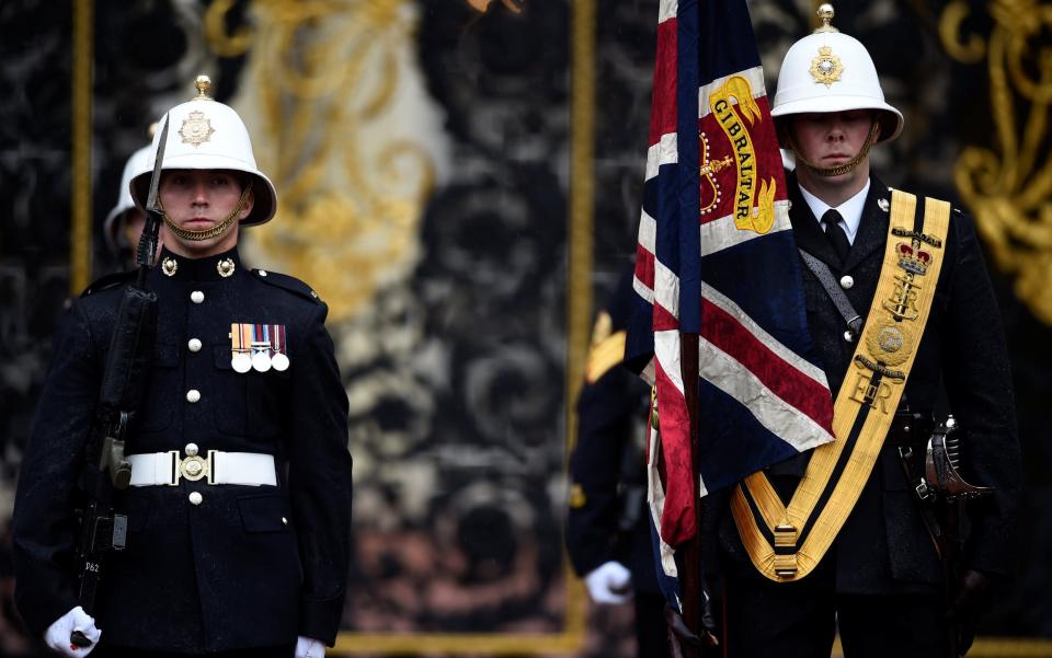 Royal Marines prepare for a parade attended by Britain's Prince Philip