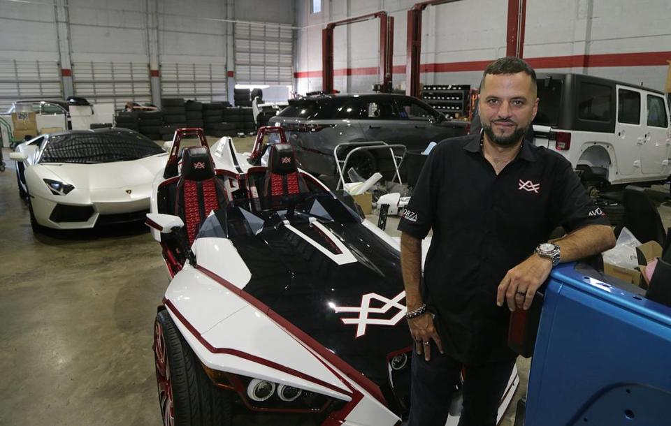 Alex Vega, owner of The Auto Firm in Kendall, where several celebrities, rappers and sports stars have had their high-end cars customized, on Sept. 13, 2018. In August 2019, he was shot three times by a man convicted of attempting to kill him in a hire-for-murder scheme. Vega survived.