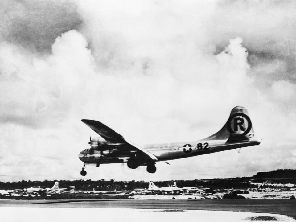 The Enola Gay lands back on Tinian after dropping an atomic bomb on Hiroshima.