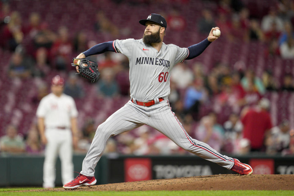 Minnesota Twins relief pitcher Dallas Keuchel throws against the Cincinnati Reds in the seventh inning of a baseball game in Cincinnati, Monday, Sept. 18, 2023. (AP Photo/Jeff Dean)