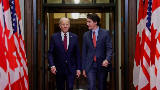 PHOTO: U.S. President Joe Biden walks with Canadian Prime Minister Justin Trudeau on Parliament Hill, March 24, 2023, in Ottawa, Ontario, Canada. (Blair Gable/Reuters)