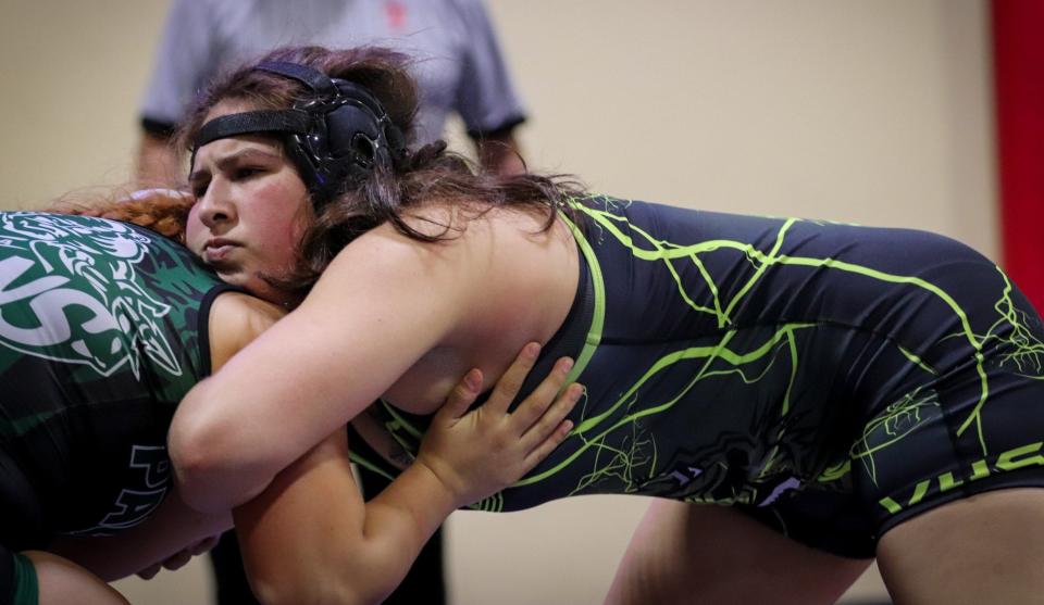 Ventura's Bela Smith has the upper hand in her match against Destiny Rodriguez of Pacifica during the Channel League wrestling championships on Saturday at San Marcos High. Smith won the 142-pound title.