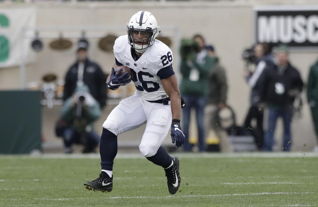 Penn State running back Saquon Barkley runs during the first half of an NCAA college football game against Michigan State, Saturday, Nov. 4, 2017, in East Lansing, Mich. (AP Photo/Carlos Osorio)