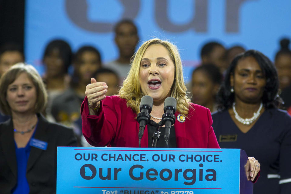 FILE - In a Friday, Nov. 2, 2018 file photo, Sarah Riggs Amico speaks during a rally for Democratic gubernatorial candidate Stacey Abrams, at Morehouse College in Atlanta. Business executive and 2018 candidate for lieutenant governor Sarah Riggs Amico announced her candidacy for the U.S. Senate Tuesday, August 27, 2019. (Alyssa Pointer/Atlanta Journal-Constitution via AP, File)