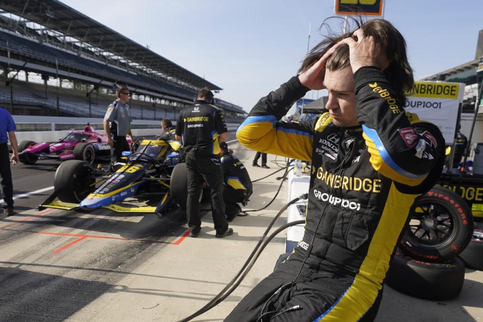 Colton Herta sits on the pit wall following practice for the Indianapolis 500 on May 17.