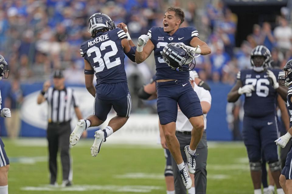 BYU’s Marcus McKenzie (32) celebrates with teammate Crew Wakley, right, after his punt recovery from Southern Utah during a game Saturday, Sept. 9, 2023, in Provo, Utah. | Rick Bowmer, Associated Press
