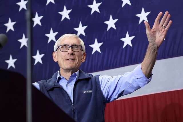 <p>Scott Olson/Getty</p> Wisconsin Gov. Tony Evers speaks at a rally on Oct. 29, 2022, in Milwaukee