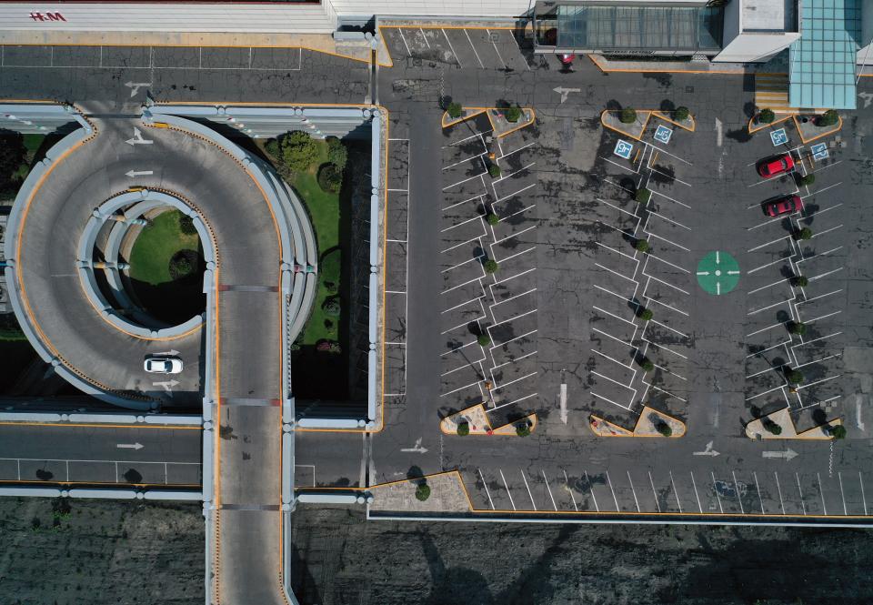 A view of the almost-empty parking lot of a closed shopping center in the Santa Fe neighborhood of Mexico City on April 4, 2020.