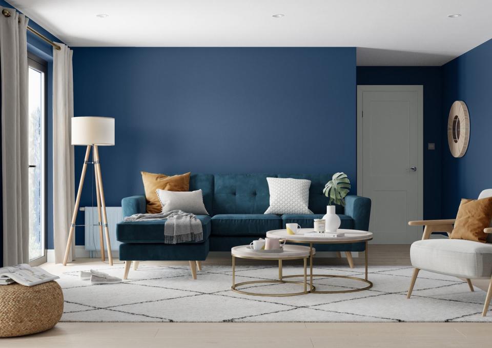 <p>A moody blue hue is a spectacular shade for the <a href="https://www.housebeautiful.com/uk/decorate/living-room/g35838996/living-room-wallpaper-ideas/" rel="nofollow noopener" target="_blank" data-ylk="slk:living room;elm:context_link;itc:0;sec:content-canvas" class="link ">living room</a>. If an all-blue living room feels too daring for you, embrace a two-tone look or bring the colour in through accessories. </p><p>'Add a lick of the rich blue shade to a feature wall or a "zone" to create an on-trend multitasking room,'suggest Dulux. 'When using a dark palette, a combination of surfaces and textures will bring depth to your space as well. Pile on the sheepskin.'</p><p>Pictured: <a href="https://go.redirectingat.com?id=127X1599956&url=https%3A%2F%2Fwww.dulux.co.uk%2Fen%2Fcolour-details%2Fsapphire-salute&sref=https%3A%2F%2Fwww.housebeautiful.com%2Fuk%2Fdecorate%2Fwalls%2Fg36128885%2Fcolour-schemes-high-traffic-rooms%2F" rel="nofollow noopener" target="_blank" data-ylk="slk:'Sapphire Salute' by Dulux;elm:context_link;itc:0;sec:content-canvas" class="link ">'Sapphire Salute' by Dulux</a>. </p>