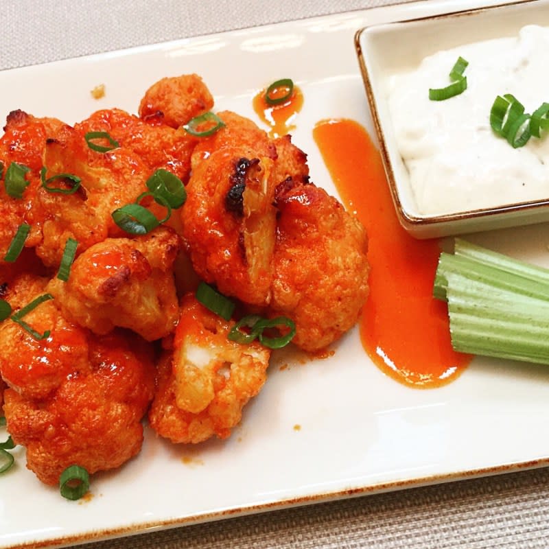 <p>Kitchen Lifestyle</p><p>Crispy outside and tender inside is what these cauliflower bites boast.</p><p><strong>Get the recipe: <a href="https://kitchenlifestyle.com/hot-honey-buffalo-cauliflower-wings" rel="nofollow noopener" target="_blank" data-ylk="slk:Hot Honey Cauliflower;elm:context_link;itc:0;sec:content-canvas" class="link rapid-noclick-resp">Hot Honey Cauliflower</a></strong></p>