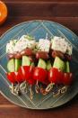 <p>Like a Greek salad on a stick!</p><p>Get the recipe from <a href="https://www.delish.com/cooking/recipe-ideas/recipes/a52183/greek-salad-skewers-recipe/" rel="nofollow noopener" target="_blank" data-ylk="slk:Delish;elm:context_link;itc:0;sec:content-canvas" class="link ">Delish</a>.</p>