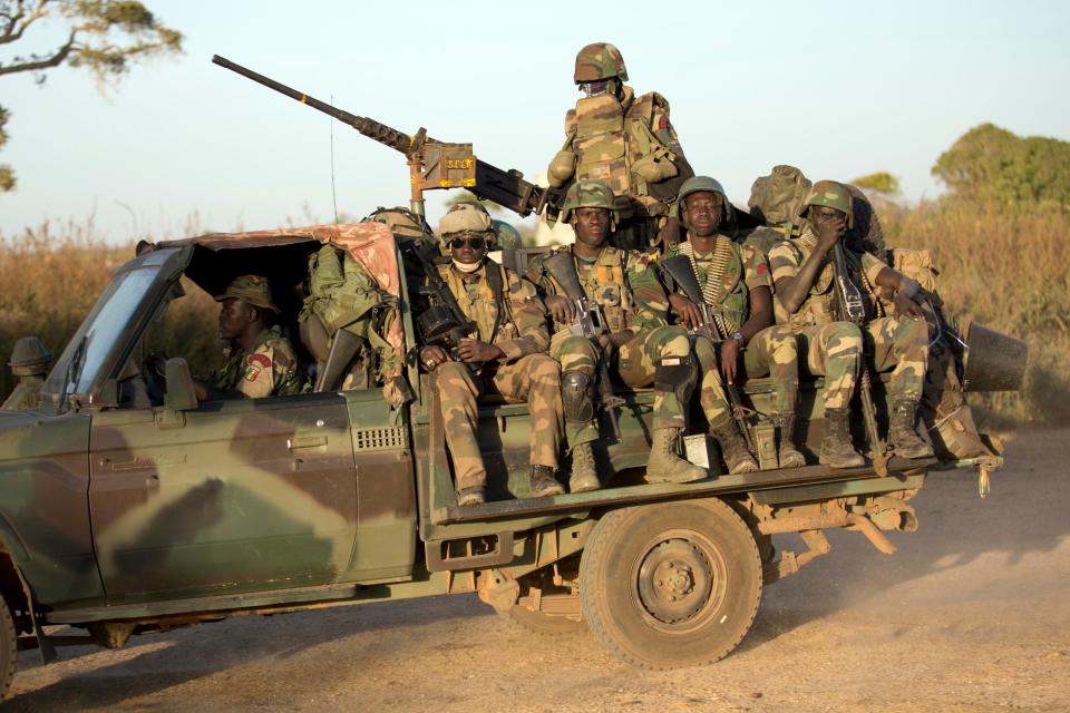 ECOWAS Senegalese troops hold their position in Barra, across from the Gambian capital Banjul Jan. 22, 2017. (AP Photo/Jerome Delay, File)