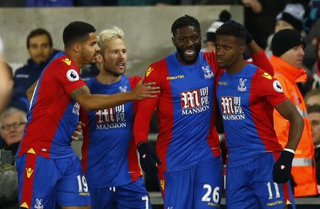 Football Soccer Britain - Swansea City v Crystal Palace - Premier League - Liberty Stadium - 26/11/16 Crystal Palace's Bakary Sako celebrates their third goal with Wilfried Zaha and team mates Action Images via Reuters / Peter Cziborra Livepic