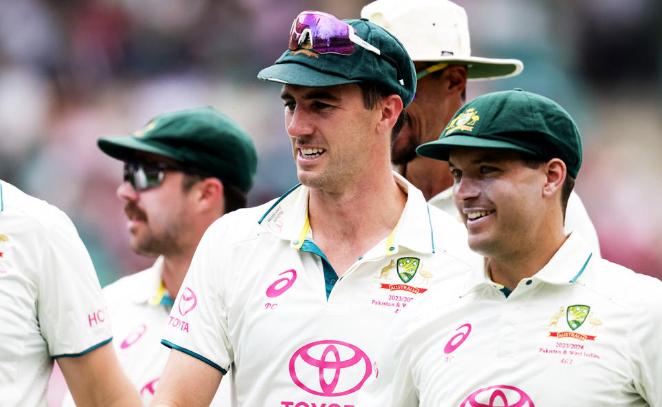 Pat Cummins and Alex Carey, pictured here after Australia's 3-0 win over Pakistan in their Test cricket series.