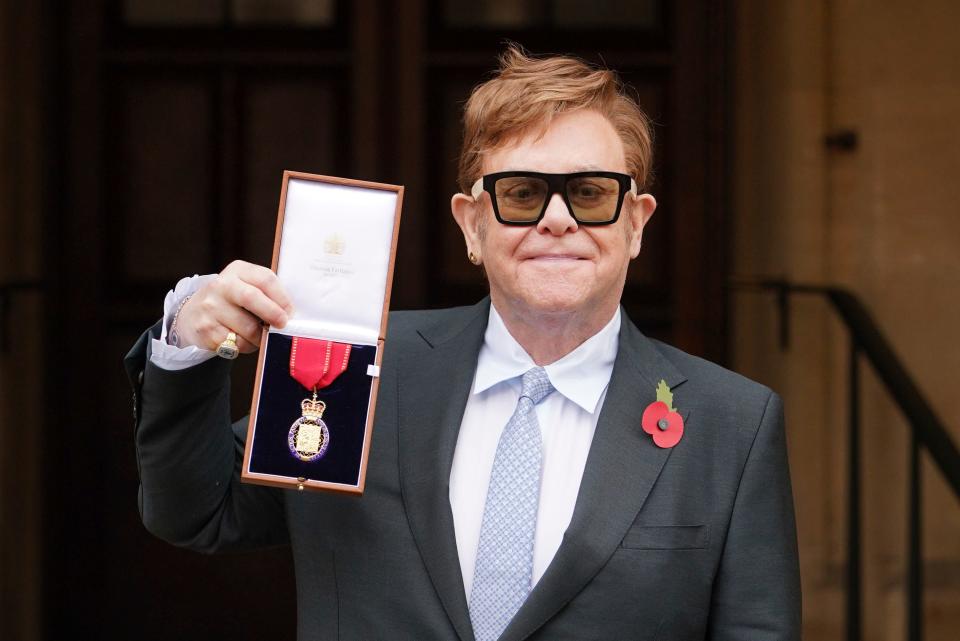 Sir Elton John is shown after being made a member of the Order of the Companions of Honour for services to Music and to Charity during an investiture ceremony at Windsor Castle, in Windsor, England, on Nov. 10.