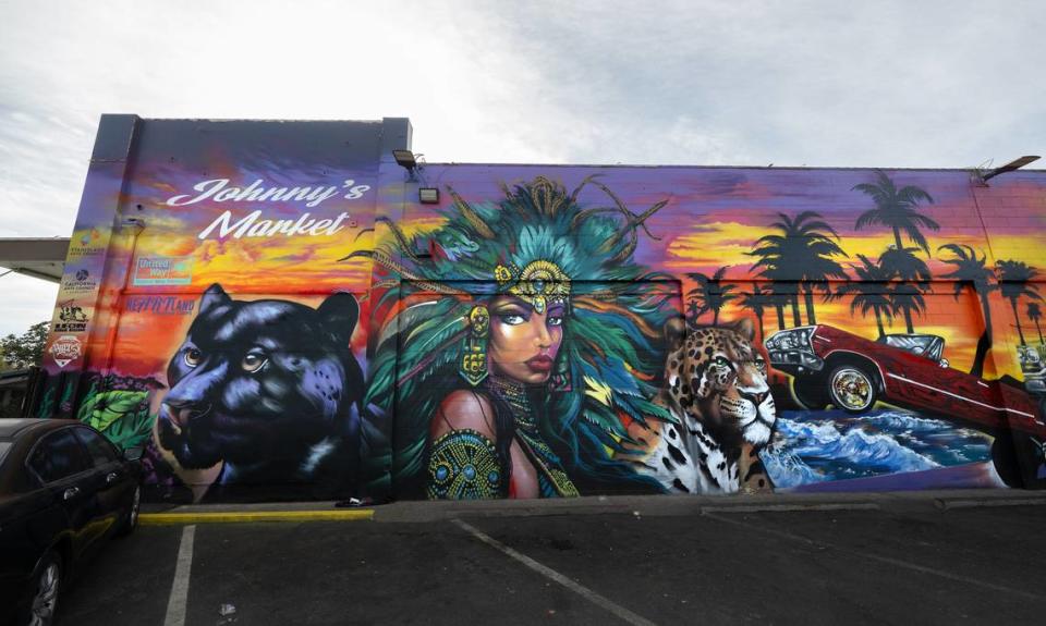 New mural by muralist Jose “Hocus” Manriquez on the east wall of Johnny’s Market on H Street in Modesto, Calif., Wednesday, Nov. 22, 2023.