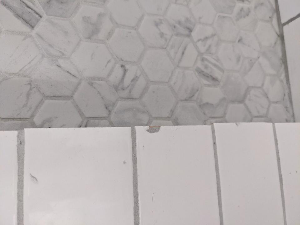 Chipped bathroom tiles