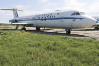 In this handout photo provided by Artmark auction house, a 119-seat "Rombac One-Eleven", one of nine such passenger jets built in Romania which was used by communist dictator Nicolae Ceausescu for official trips between 1986 and 1989, is parked at a military base in Otopeni, Romania, May 4, 2021. An airplane used for official trips by Romania's late communist leader Nicolae Ceausescu will be put up for auction on May 27 with a starting price of 25,000 euros (30,000 USD). (Artmark via AP)