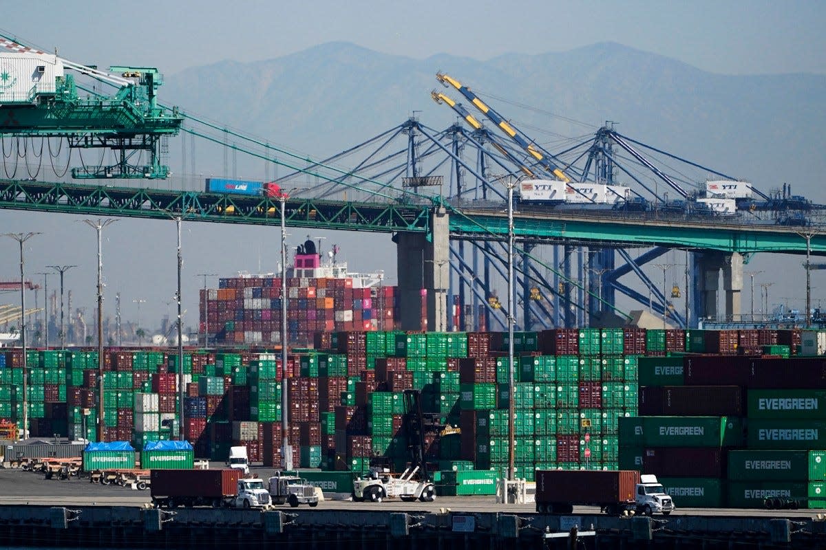 Containers are stacked at the Port of Los Angeles in Los Angeles on Oct. 1, 2021. The backlog is driving delays in arrival of medical equipment.