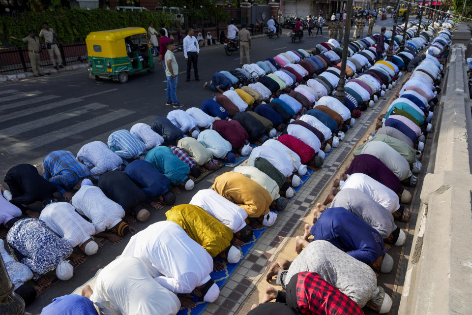 Muslims offer Eid al-Adha prayers outside Sidi Saiyyed Mosque in Ahmedabad, India, Monday, June 17, 2024. (AP Photo/Ajit Solanki)