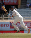 India's Cheteshwar Pujara plays a shot. REUTERS/Adnan Abidi