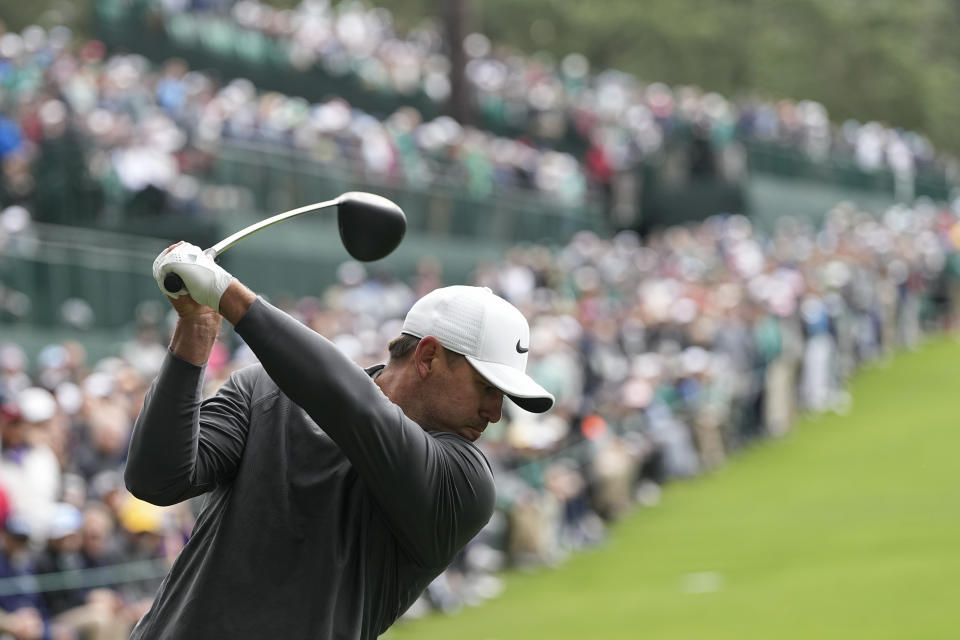 Brooks Koepka hits his tee shot on the 14th hole during the weather delayed third round of the Masters golf tournament at Augusta National Golf Club on Sunday, April 9, 2023, in Augusta, Ga. (AP Photo/David J. Phillip)