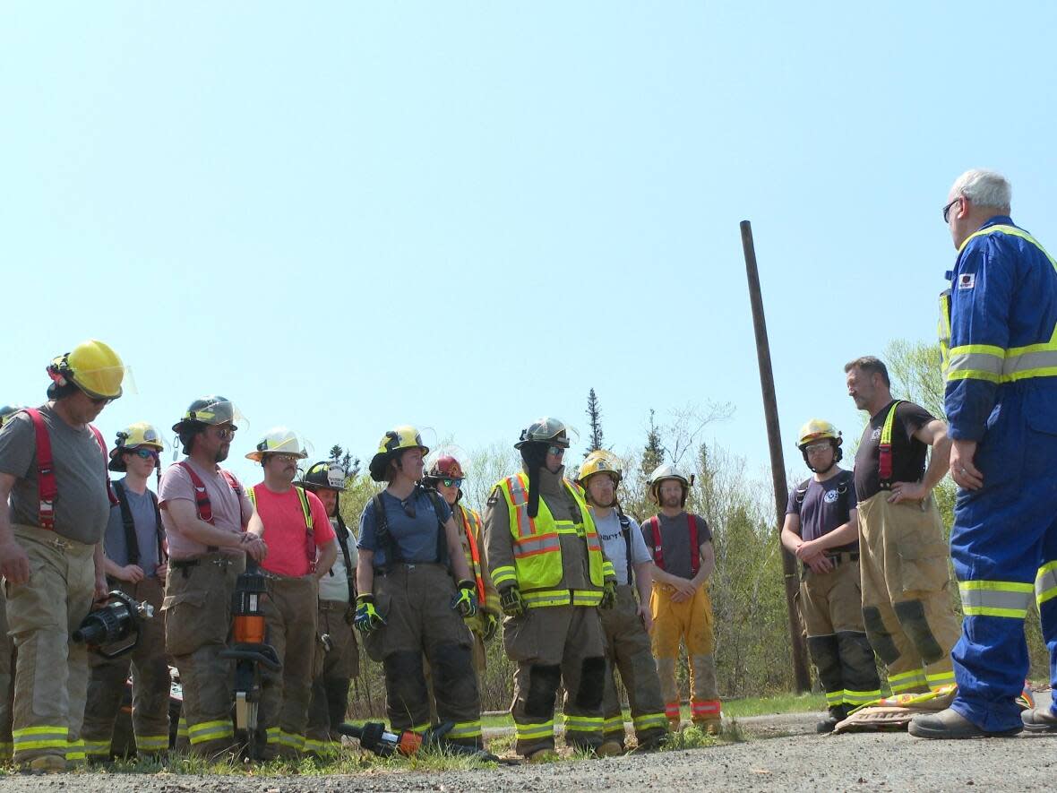 A class on using extrication equipment wraps up in Grand Falls-Windsor during fire training courses this week. (Troy Turner/CBC - image credit)
