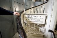 A sign bars entry to the infrastructure holding up the ceiling of the rotunda within the US Capitol dome on Capitol Hill in Washington, December 19, 2013. Americans longing for a makeover in Washington will get their wish partially granted as the dome of the U.S. Capitol - but not the lawmakers who work inside - undergoes a $60 million restoration. The dome will be undergoing a restoration project to halt deterioration of the dome's cast iron as well as ensure the protection of the interior of the dome and rotunda. (REUTERS/Douglas Graham/POOL)