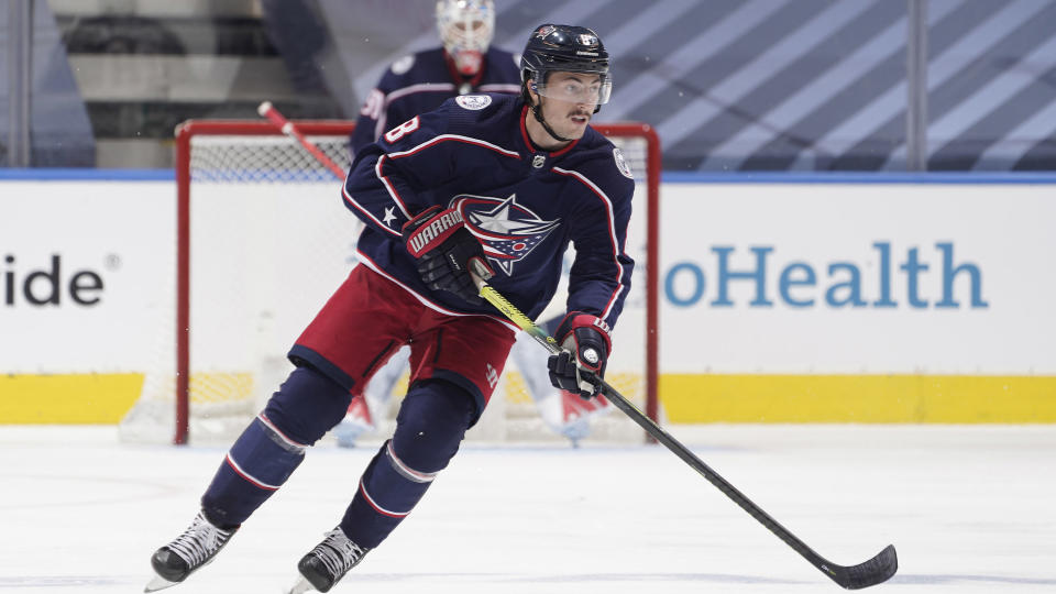 TORONTO, ONTARIO - JULY 30: Zach Werenski #8 of the Columbus Blue Jackets skates the puck through the neutral zone during an exhibition game against the Boston Bruins prior to the 2020 NHL Stanley Cup Playoffs at Scotiabank Arena on July 30, 2020 in Toronto, Ontario. (Photo by Mark Blinch/NHLI via Getty Images)